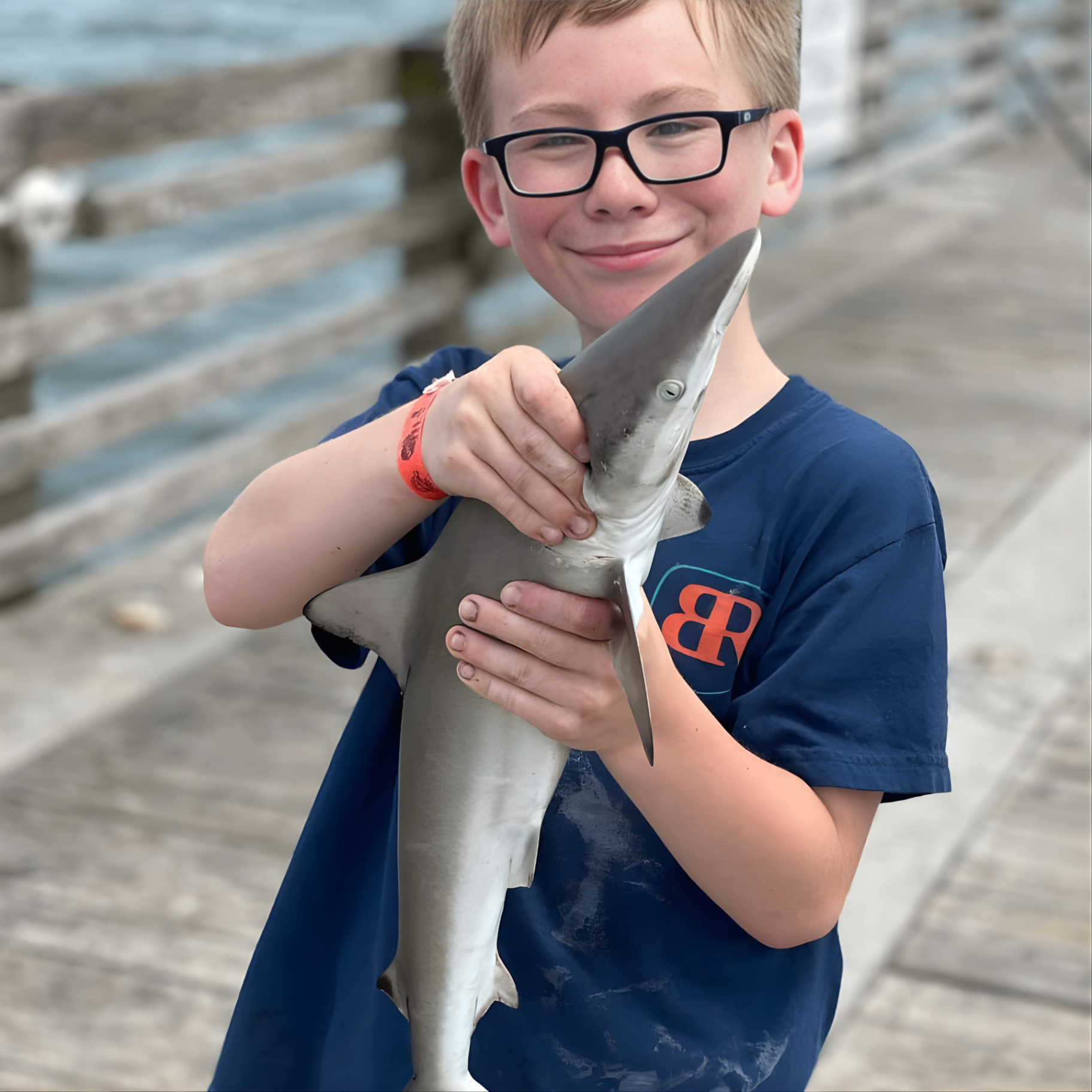 Kids learning to fish on the pier